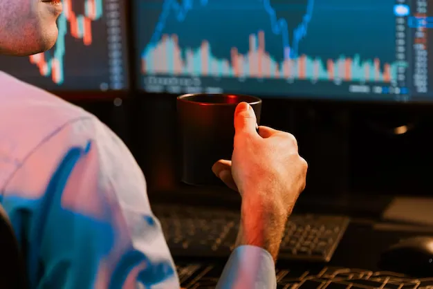 Man drinking coffee in front of two monitors, watching live trading charts (source: https://www.freepik.com/premium-photo/cropped-working-business-trader-holding-coffee-cup-focusing-stock-gusher_340237100.htm#fromView=keyword&page=1&position=9&uuid=aec82ddb-da24-40f6-8171-e5cbcd094f1a&query=Prop+trading)